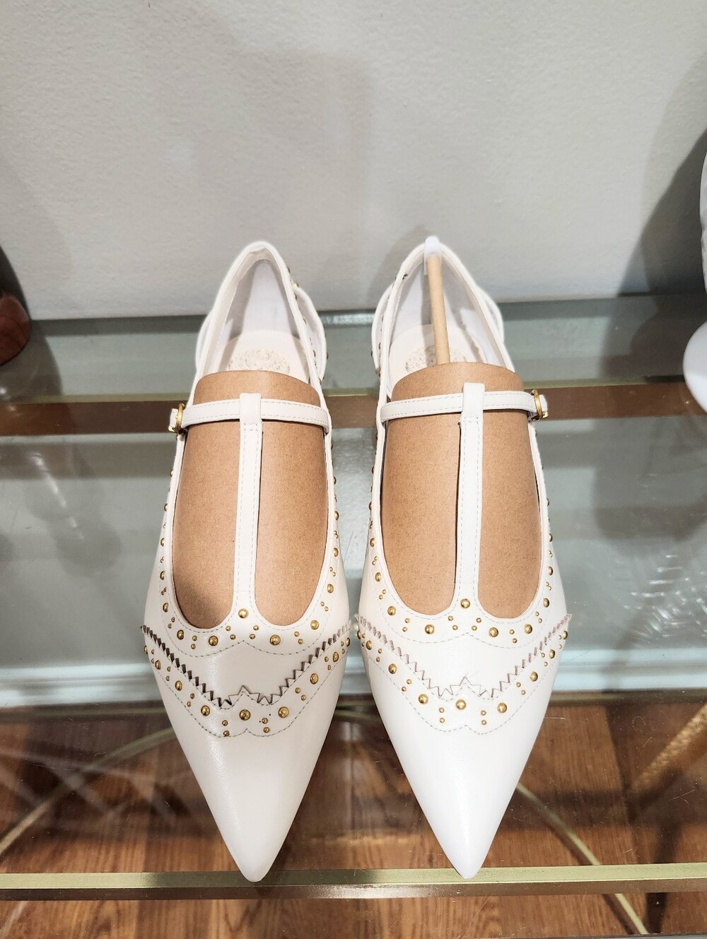 Vince Camuto Valkie Women’s White Pointed T-Strap Flats with Gold Stud Accents